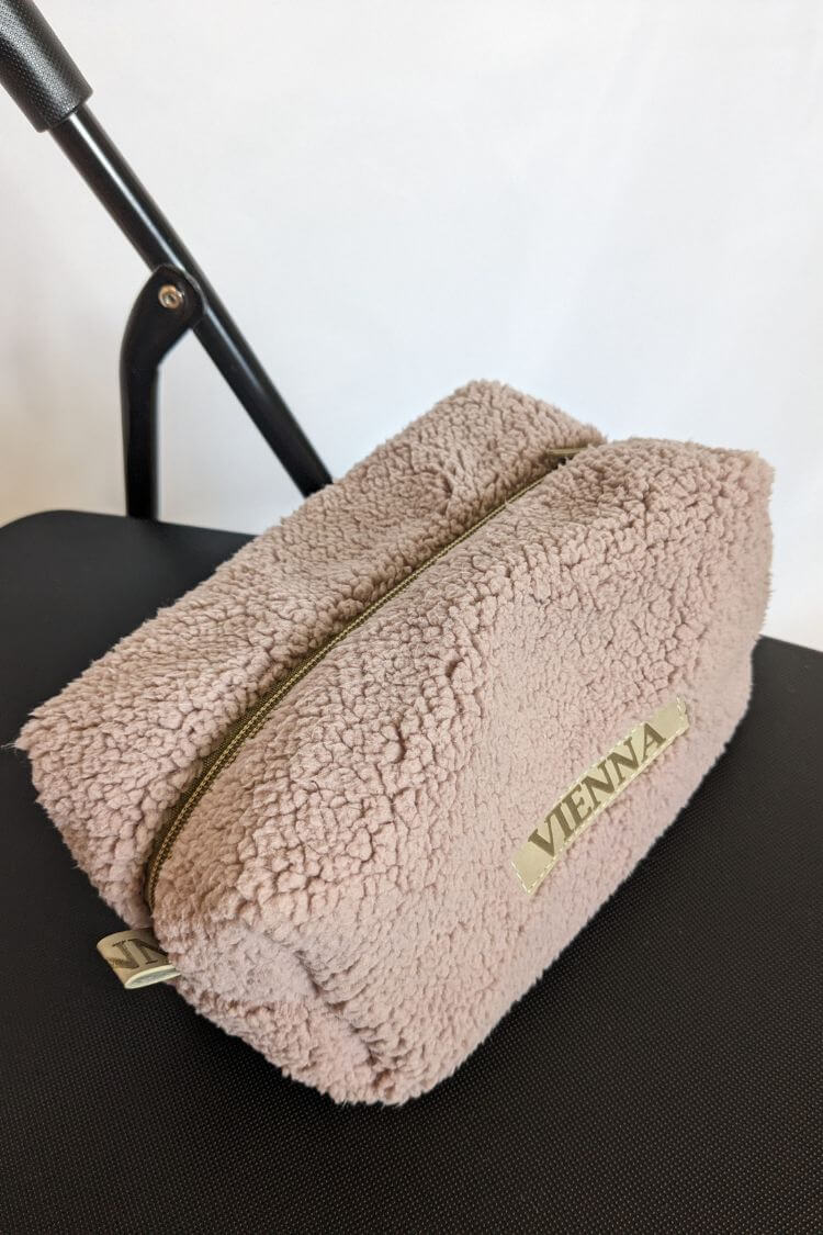 Plush cosmetic bag with Vienna patch 032S06